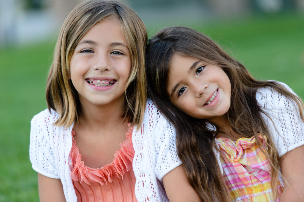 Happy Sisters at the Park